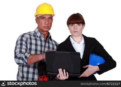 Architect and engineer with a laptop
