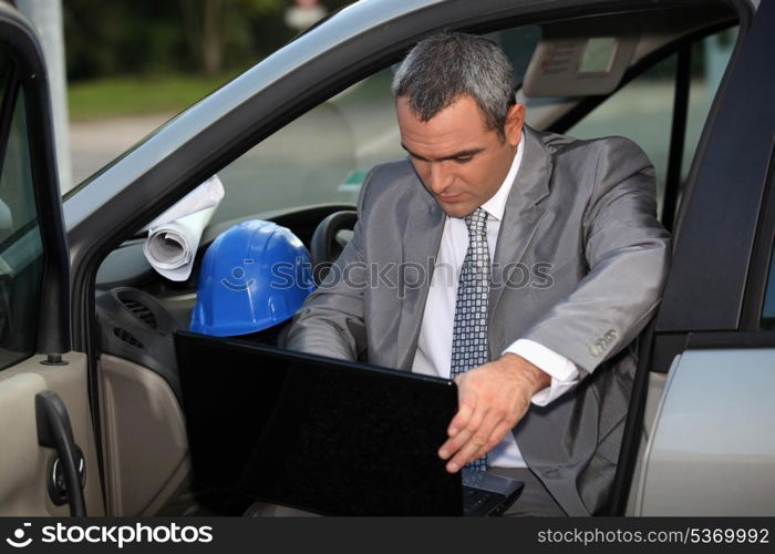 Architect arriving at construction site