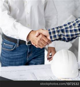 architect client hand shaking. High resolution photo. architect client hand shaking. High quality photo