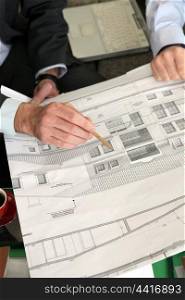 Architect debating over project details