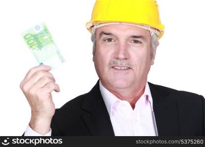 Architect holding bank note