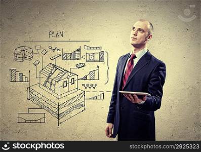 Architect holding tablet pc