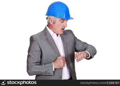 Architect looking at wrist watch