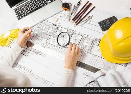 architect making plan with loupe