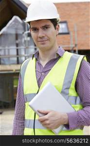 Architect On Building Site With Digital Tablet