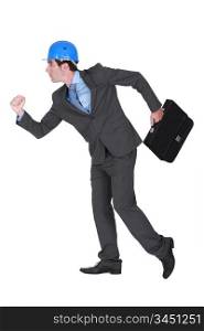 Architect running with briefcase