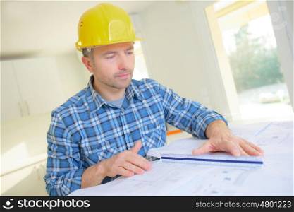 architect sketching a construction project