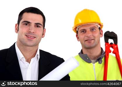 Architect standing with laborer