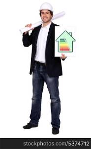 Architect stood with energy rating poster
