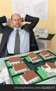 Architect with a model housing estate