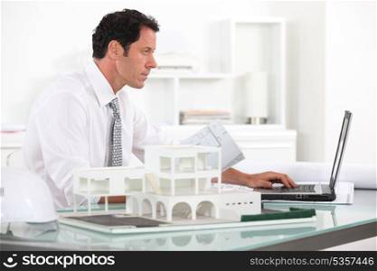 Architect working in his office