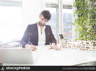Architect working in office