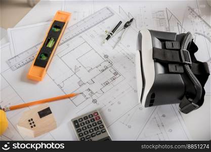 Architect workplace top view. Architectural blueprint paper project plans on desk table, tool for engineer contractor building design working drawing and VR glasses, industry virtual technology