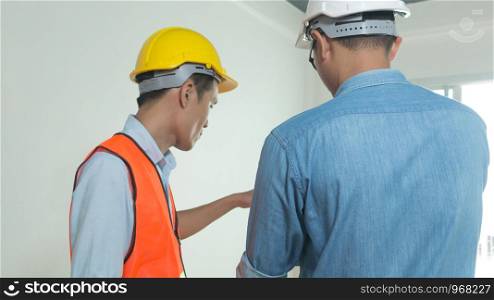 Architects and engineers examine the interior of the home to create a successful building plan before delivering quality housing to the customer.
