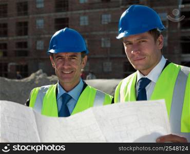 Architects on building site