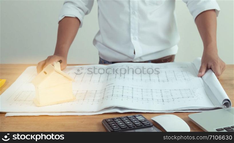 Architects who work on blueprints. Architect&rsquo;s Workplace - Architectural Blueprint Project Construction concept Engineering tools Side view