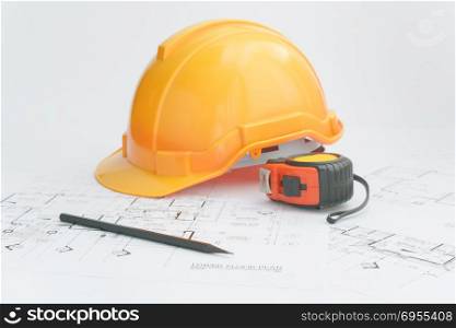 Architects workplace - architectural tools, blueprints, helmet, measuring tape, Construction concept. Engineering tools.