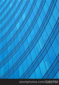 Architectural abstract of glass windows in office building.