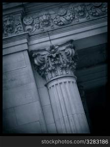 Architectural detail of pillar and cornice.