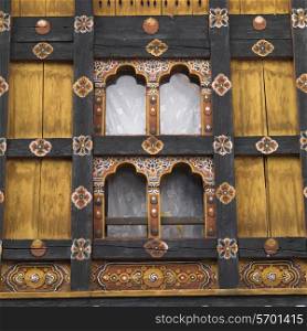 Architectural details of the windows of Rinpung Dzong, Paro Valley, Paro District, Bhutan