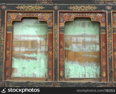 Architectural details of windows of a building, Chokhor Town, Bumthang District, Bhutan