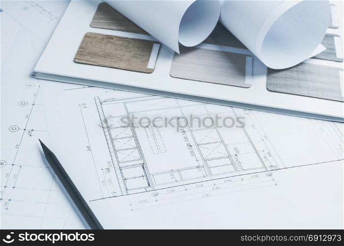 architectural drawings paper with color and material samples for construction