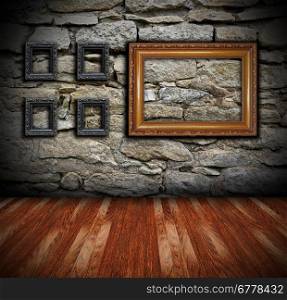 architectural interior backdrop with wooden floor and painting frames on grungy wall