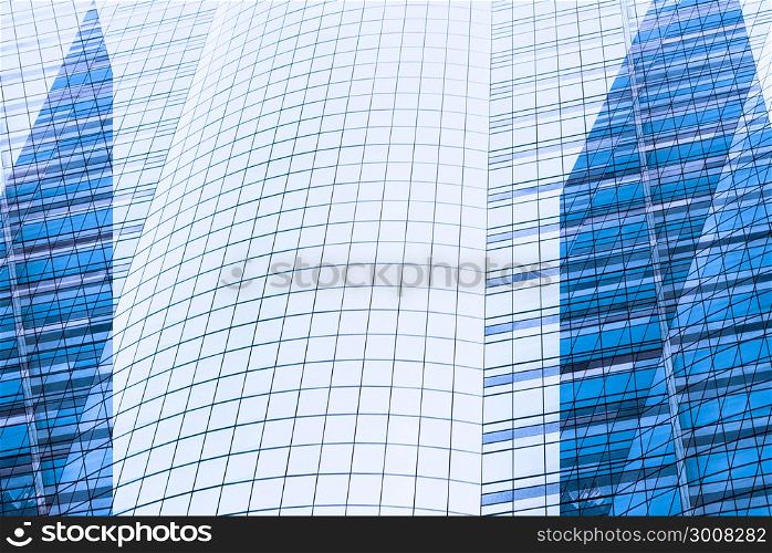 Architecture close up, windows of skyscraper. Glass and concrete. Urban landscape , City Business District. Modern abstract background. glass facades of modern of tall buildings and skyscraper.