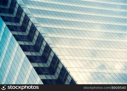 Architecture close up, windows of skyscraper. Glass and concrete. Urban landscape , City Business District. Modern abstract background. glass facades of modern of tall buildings and skyscraper.