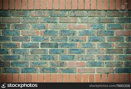 Architecture. Closeup of red blue brick wall as texture or background. Architectural detail.