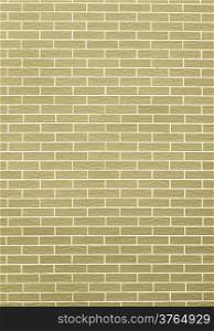 Architecture. Closeup of yellow green brick wall as background texture or pattern