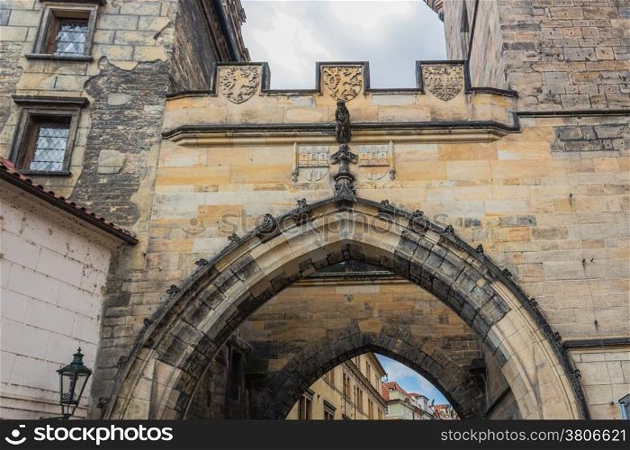 Architecture details, tower and sculpture of Charles Bridge in Prague