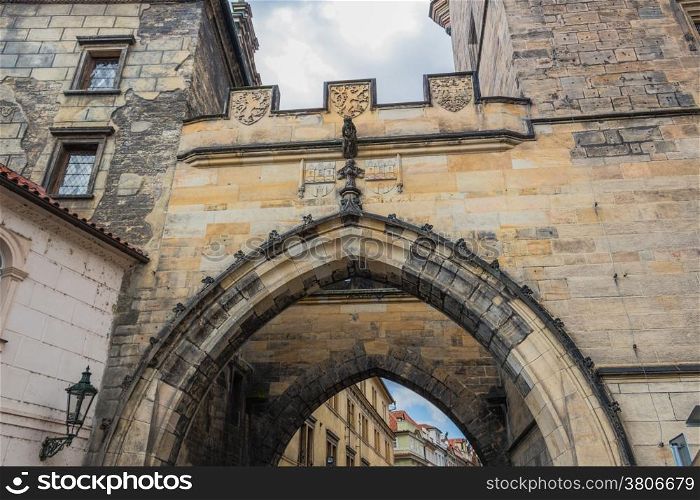 Architecture details, tower and sculpture of Charles Bridge in Prague