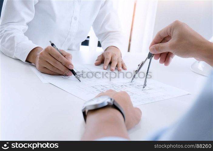 architecture drawing on architectural project, business, architecture, building, construction and people concept