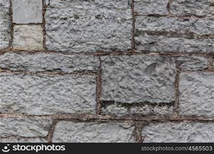 architecture, masonry, stonework and exterior concept - close up of old brick or stone wall background