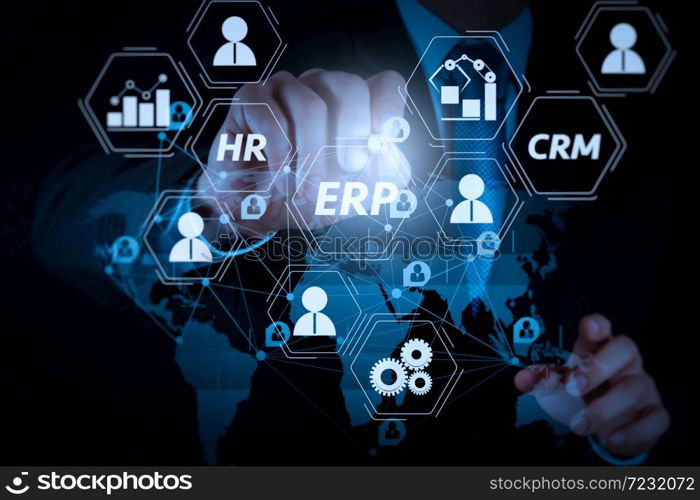 Architecture of ERP (Enterprise Resource Planning) system with connections between business intelligence (BI), production, CRM modules and HR diagram.businessman working with new modern computer.