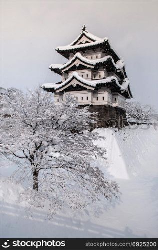 Architecture of Hirosaki Castle in winter season, whole area covered with white beautiful snow, Aomori, Tohoku, Japan