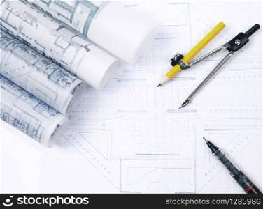 architecture plant on working table with pen and circle compass construction and architectural theme. architecture plant on working table with pen and circle compass