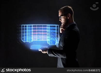 architecture, technology and construction concept - businessman with transparent tablet pc computer and virtual building blueprint projection. man with tablet and virtual construction project. man with tablet and virtual construction project