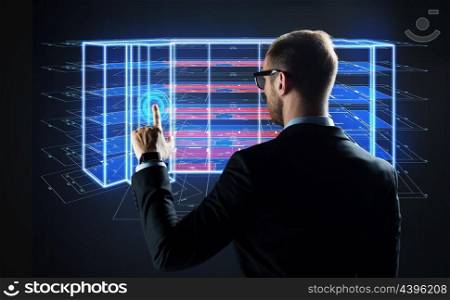 architecture, technology and construction concept - businessman with virtual building blueprint projection on screen. businessman with virtual construction project. businessman with virtual construction project