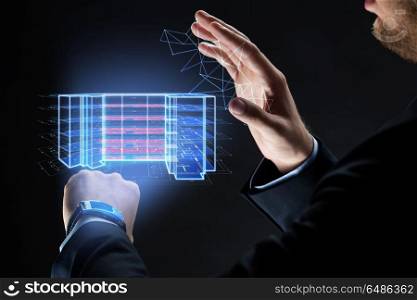 architecture, technology and construction concept - close up of businessman hands with smart watch and virtual building blueprint projection. male hands with virtual construction project. male hands with virtual construction project