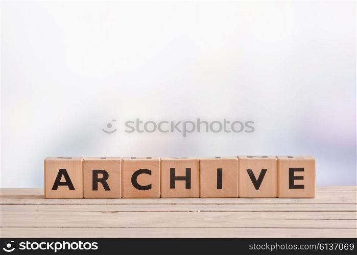 Archive sign made of blocks on a wooden desk