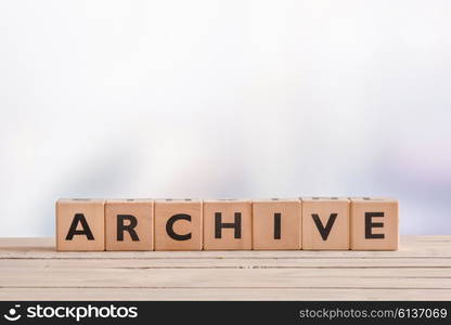 Archive sign made of blocks on a wooden desk