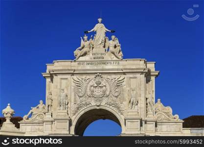 Arco da Rua Augusta with statues and blue sky, Lisbon, Portugal&#xA;