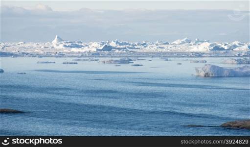 Arctic landscape in Greenland. Arctic landscape in Greenland around Disko Island with icebergs and mountains