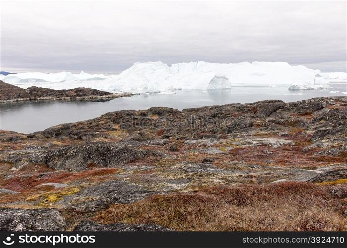 Arctic landscape in Greenland with icebergs. Arctic landscape in Greenland around Disko Island with icebergs