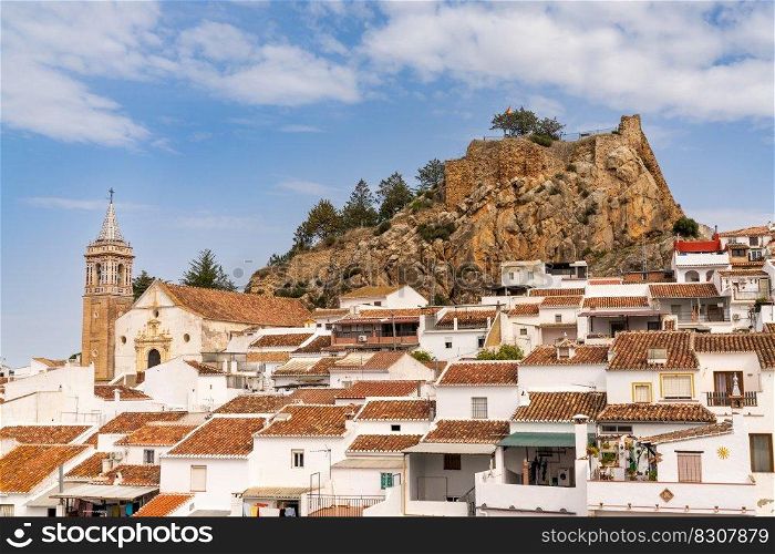 Ardales, Spain - 24 February, 2022  the historic whitewashed Andalusian village of Ardales with its church and Moorish castle ruins