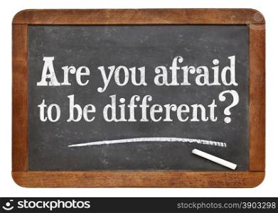 Are you afraid to be different question on a vintage slate blackboard