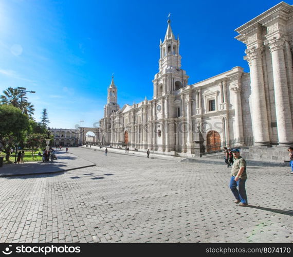 AREQUIPA PERU NOVEMBER 9: Main square of Arequipa with church on november 9 2015 in Arequipa Peru. Arequipa's Plaza de Armas is one of the most beautiful in Peru.