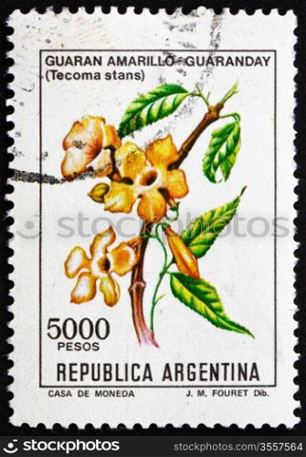 ARGENTINA - CIRCA 1982: a stamp printed in the Argentina shows Yellow Trumpetbush, Tecoma Stans, shrub, circa 1982